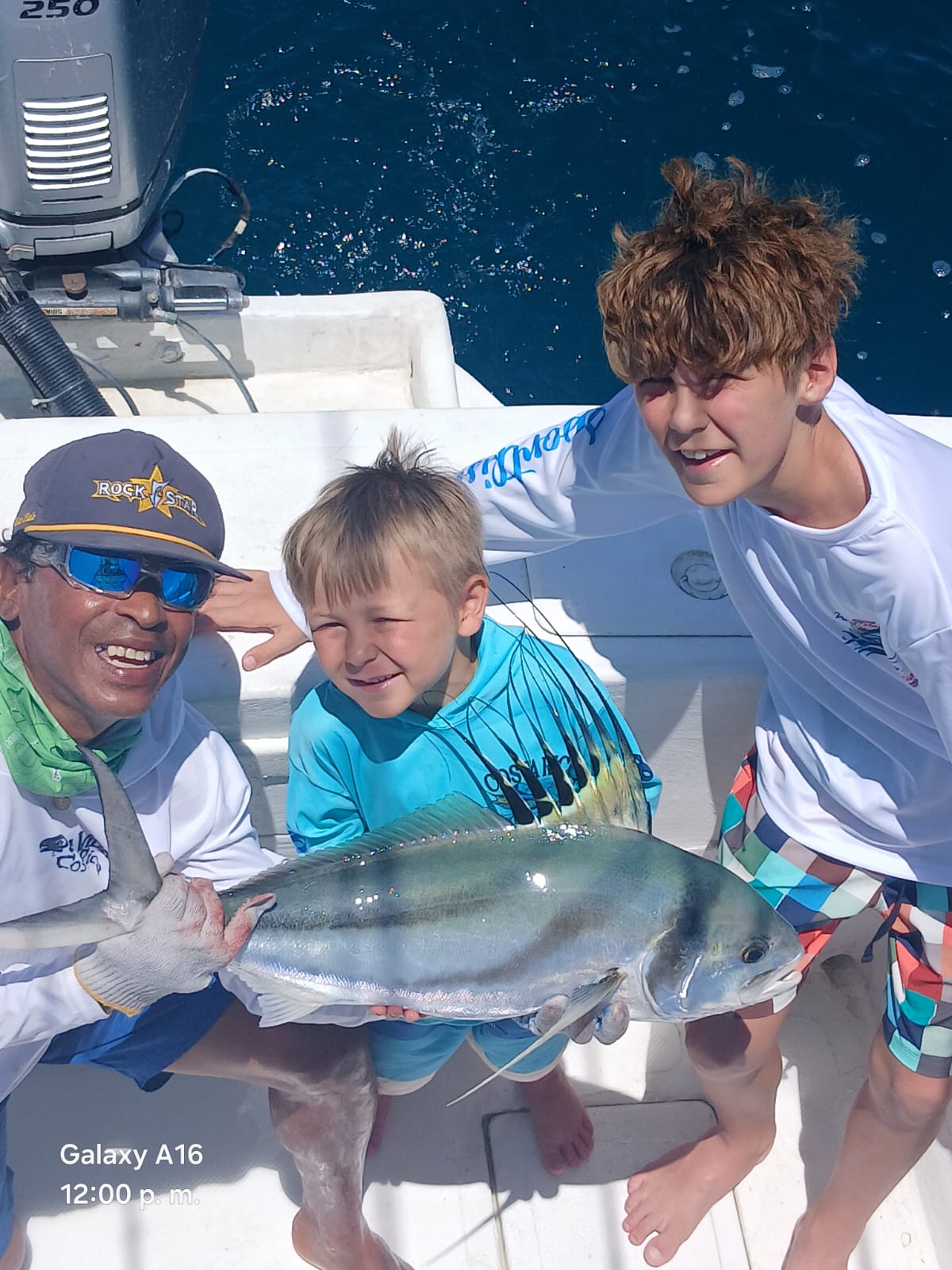 Young anglers with a roosterfish