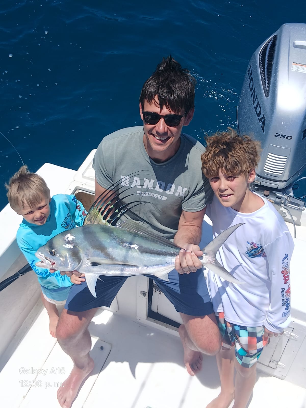 Family with a roosterfish